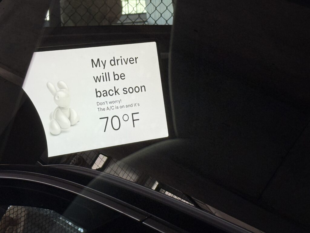 Tesla’s New Dog Mode Live Activity: Because Who Doesn’t Want a Lock Screen Full of Puppy Stares?